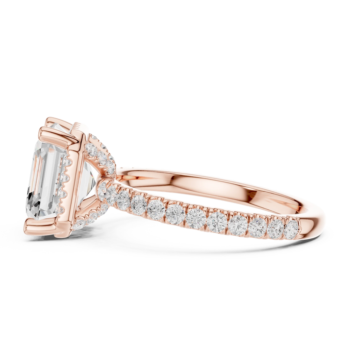 Side view of rose gold Asscher cut solitaire ring highlighting hidden halo and domed band profile