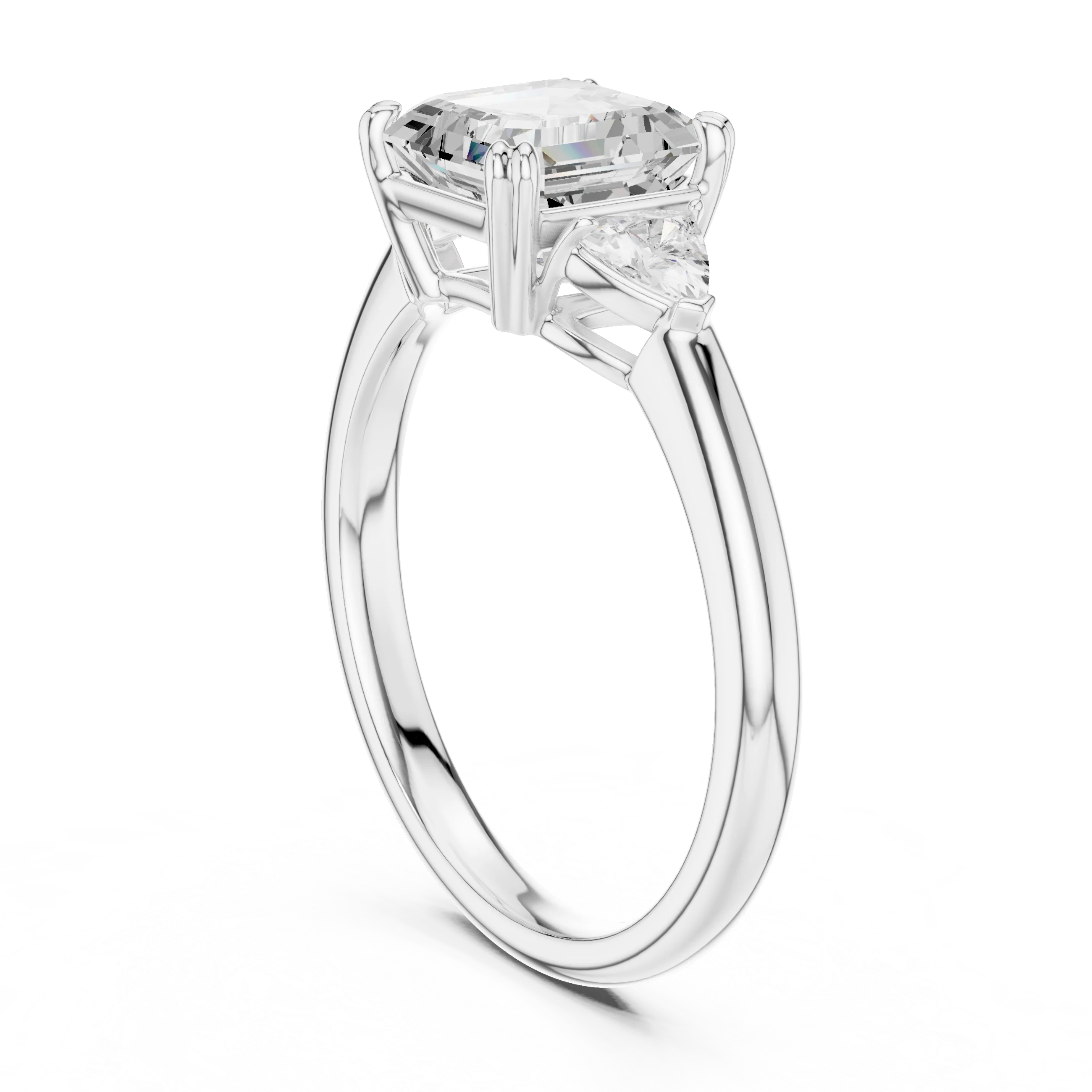 Back view of white gold Asscher three-stone ring showing half-moon side stones and setting details