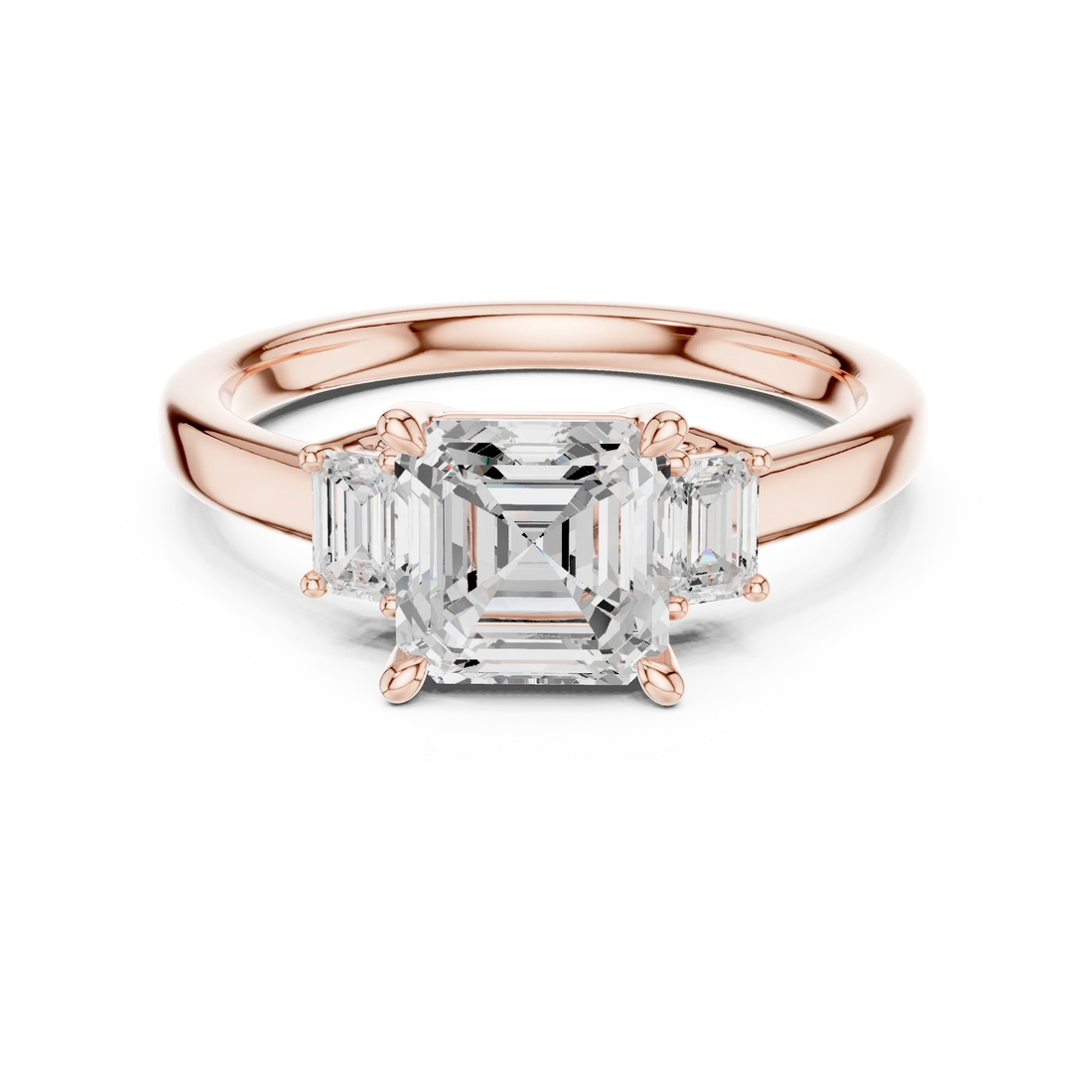 Lab-grown Asscher cut three stone diamond ring in rose gold, soft tone top view.