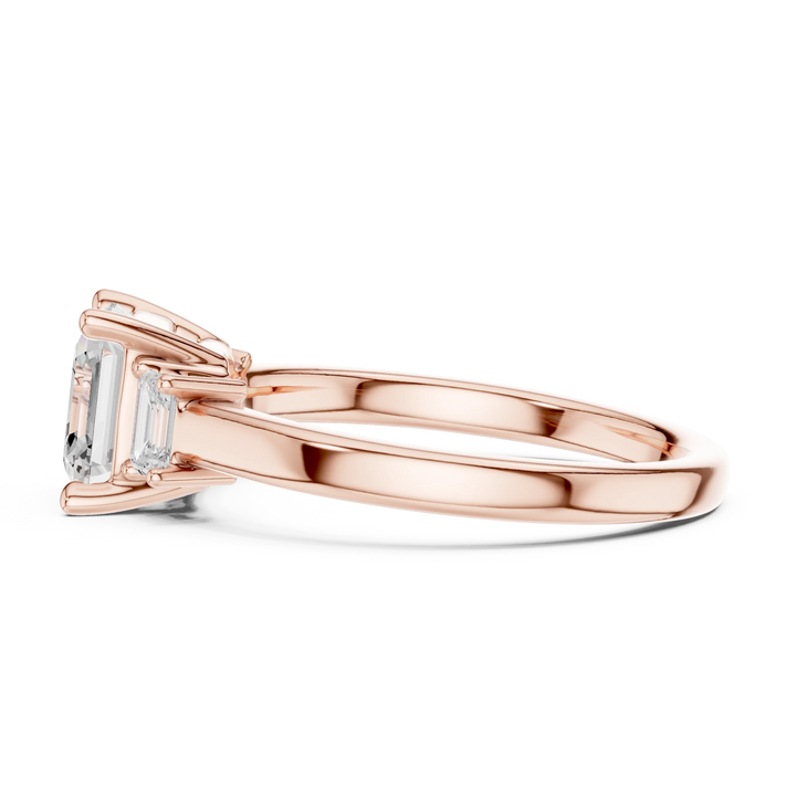 Side view of rose gold Asscher cut three stone diamond ring, highlighting design profile.