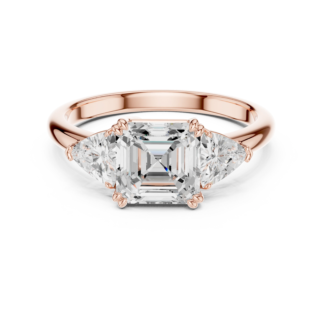 Asscher three-stone ring in rose gold with trillion cut side stones and lab-grown diamond – Australia