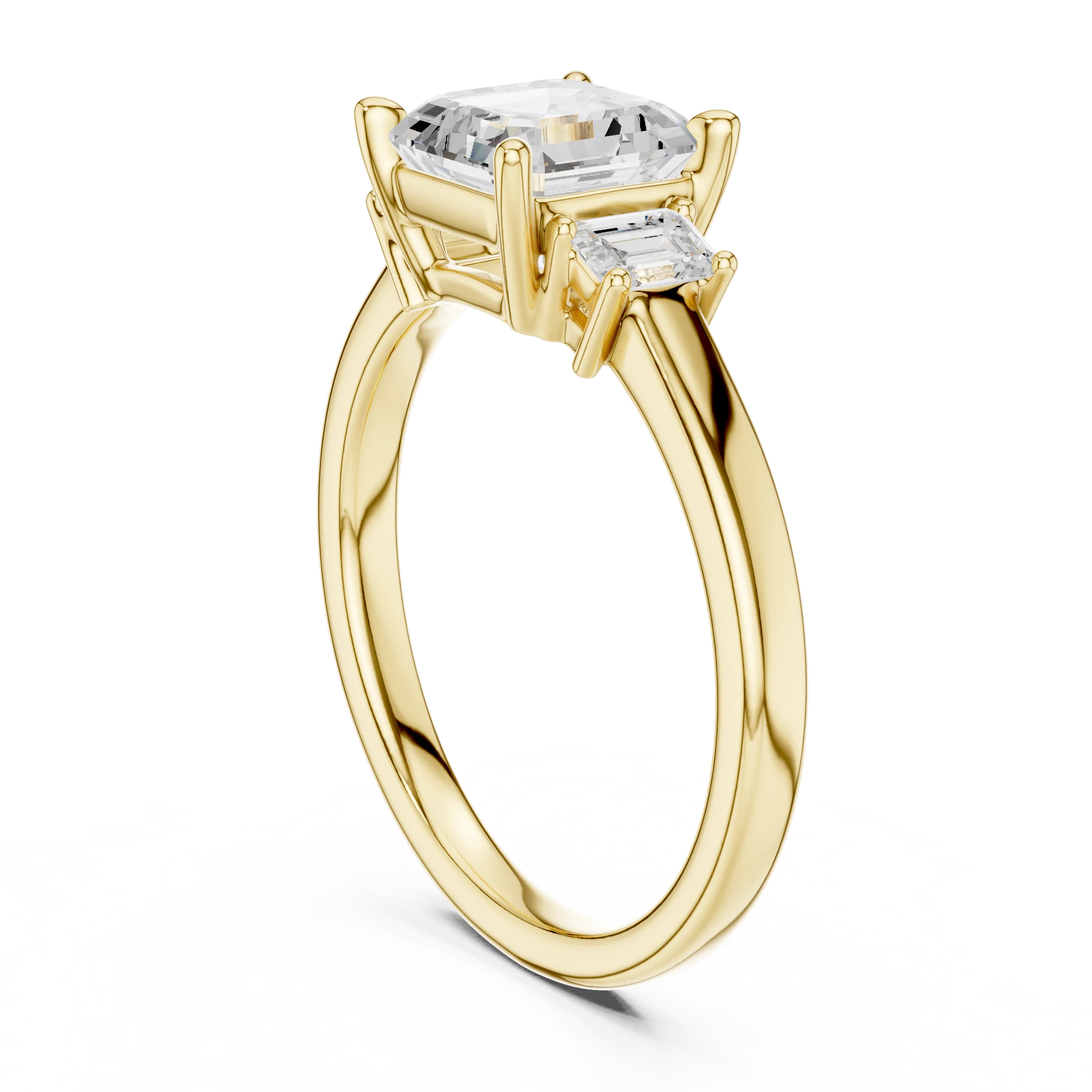 Back side view of yellow gold Asscher three stone diamond ring, showing band structure.
