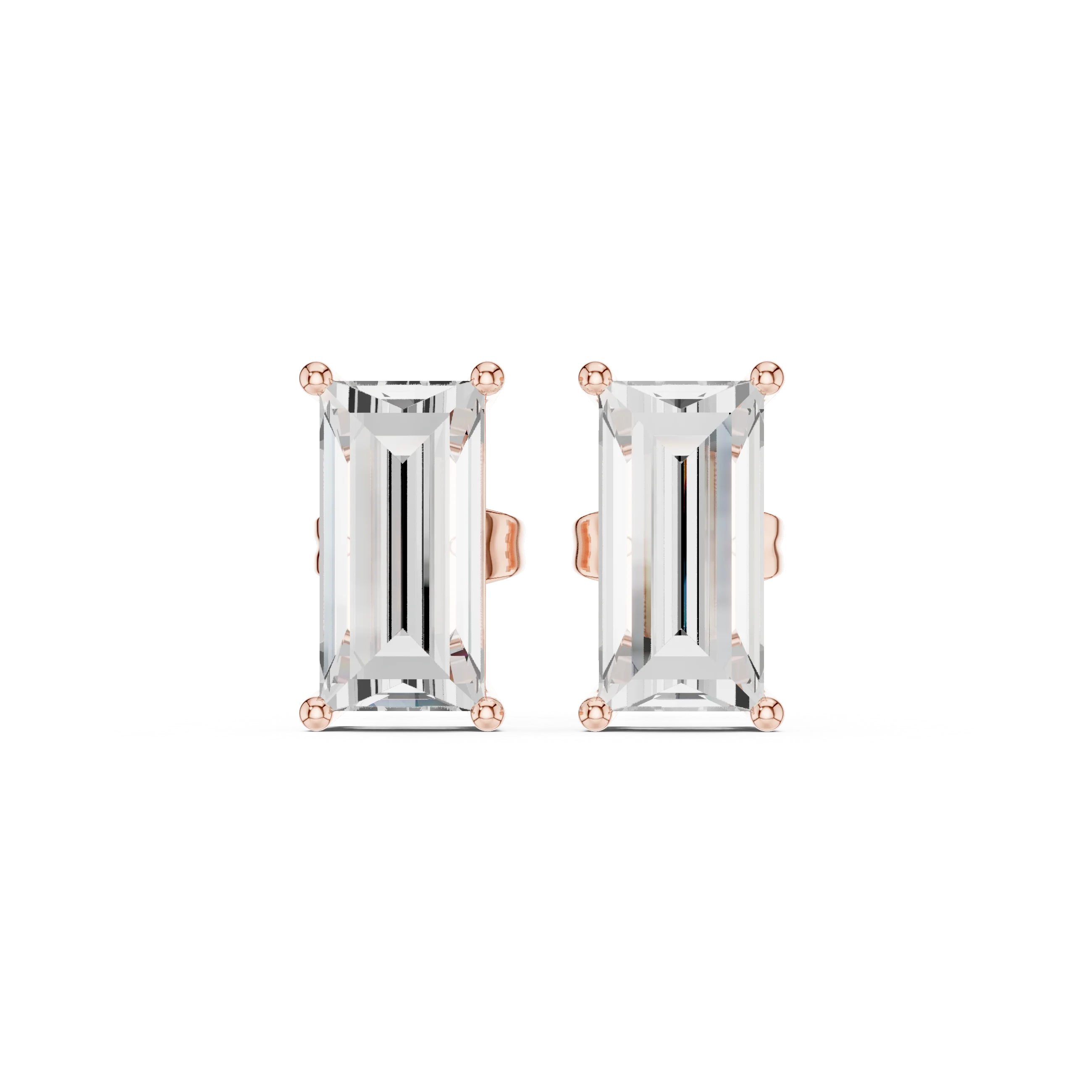 Pair of emerald-cut gemstone earrings with rose gold settings on a white background