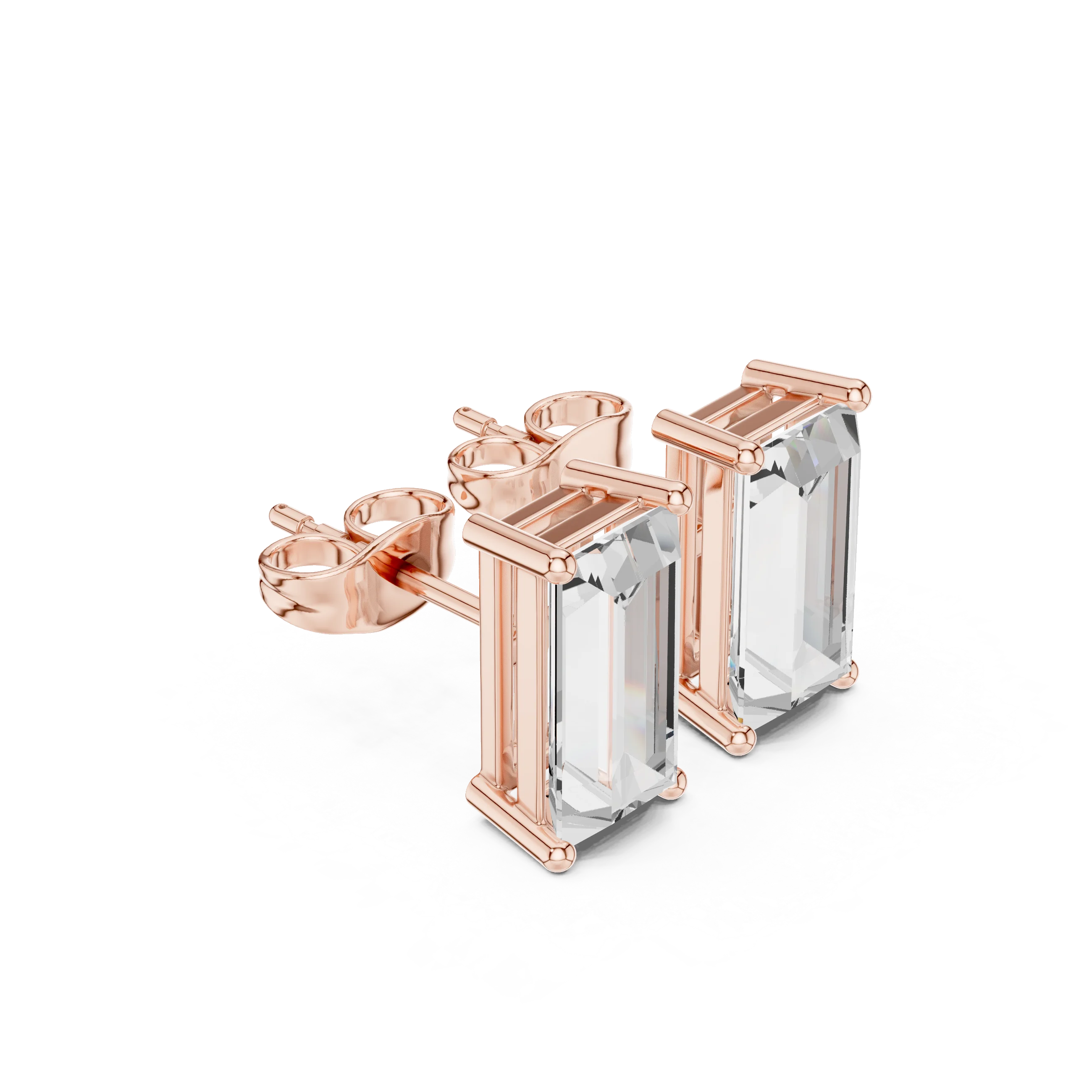 Rose gold earrings with clear gemstones on a white background