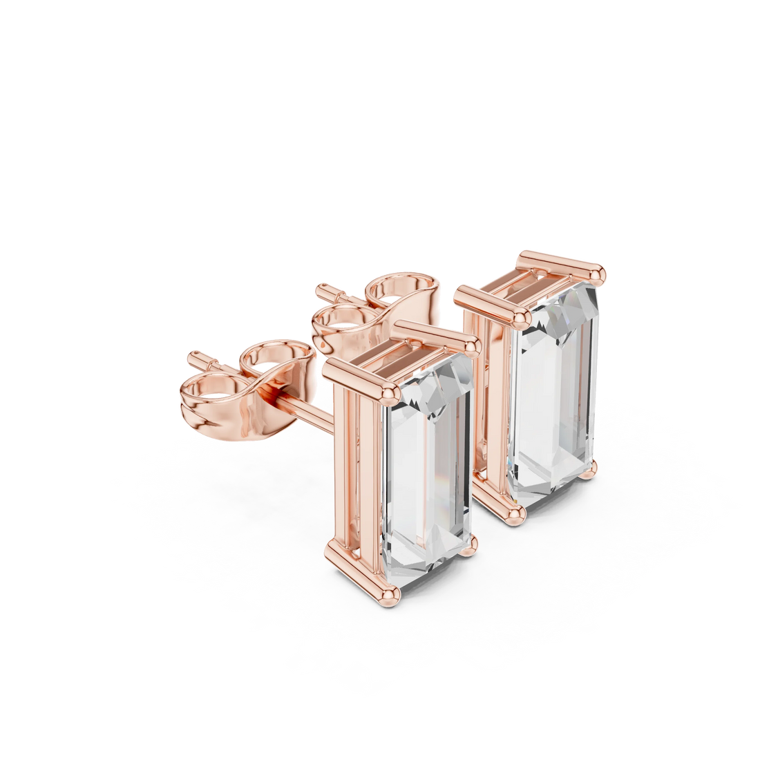 Rose gold earrings with clear gemstones on a white background