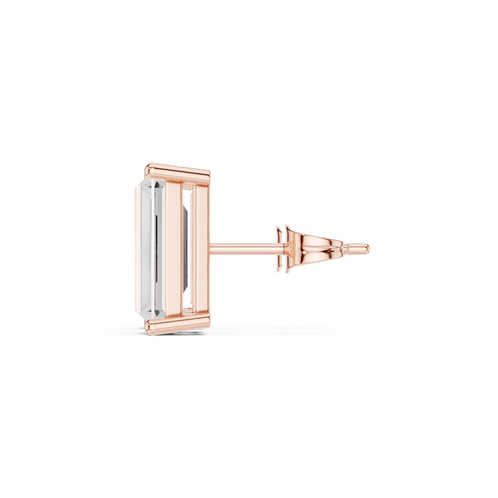 Rose gold and silver earring on a white background with side view