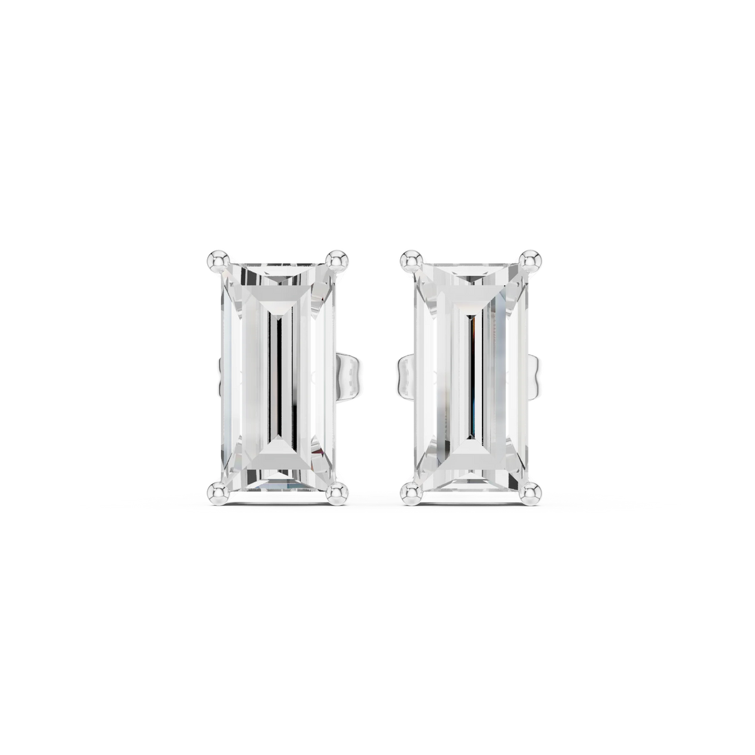 Pair of emerald-cut stud earrings on a white background