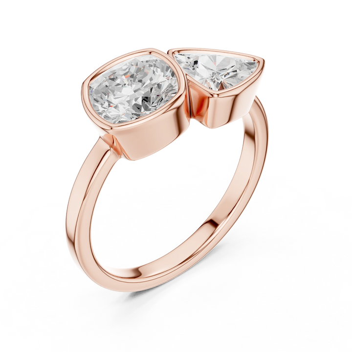 Bezel Toi et Moi rose gold ring with cushion and trillion lab-grown diamonds front view