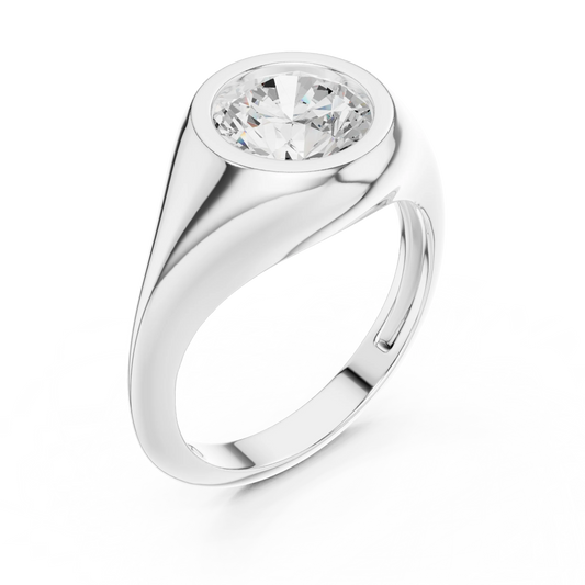 Front view of white gold round cut bezel set signet ring, showcasing center stone.