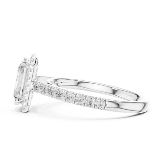 Side view of white gold radiant cut diamond ring with brilliant halo setting highlighting elevated center stone and band profile