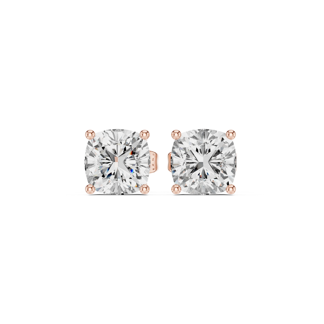 Pair of diamond stud earrings in rose gold on a white background