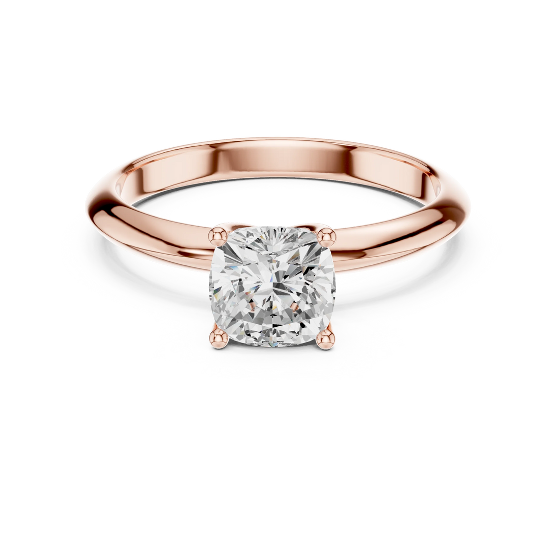 Lab-grown cushion cut diamond solitaire ring in rose gold, soft tone top view.