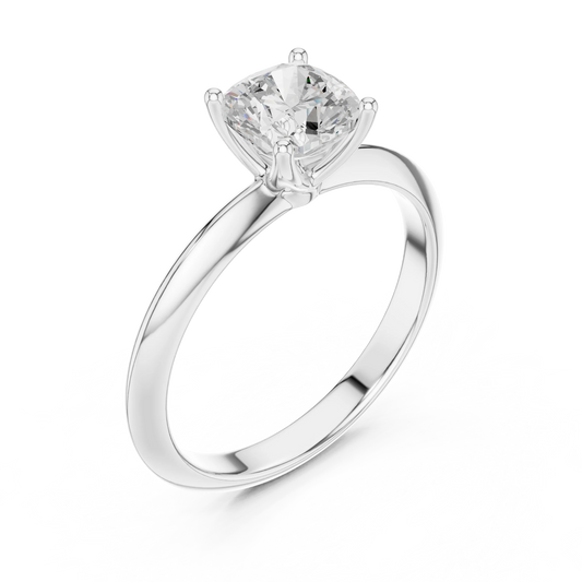 Front view of white gold cushion cut diamond solitaire ring, showcasing center stone