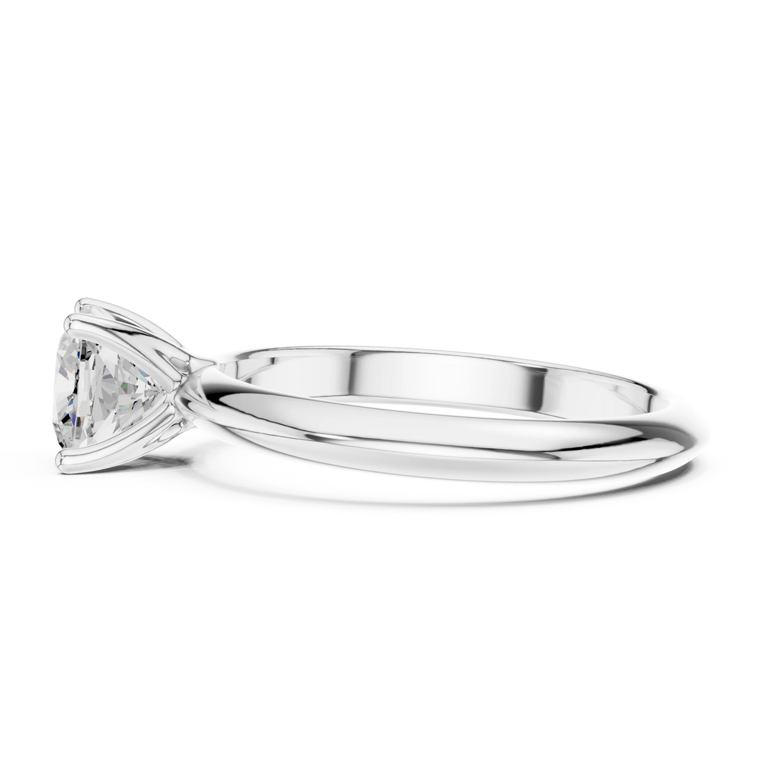 Side view of white gold cushion cut diamond solitaire ring, highlighting prong setting.