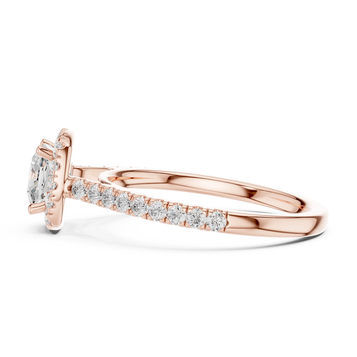 Side view of rose gold cushion-cut halo ring with pavé diamond band and lab-grown center stone