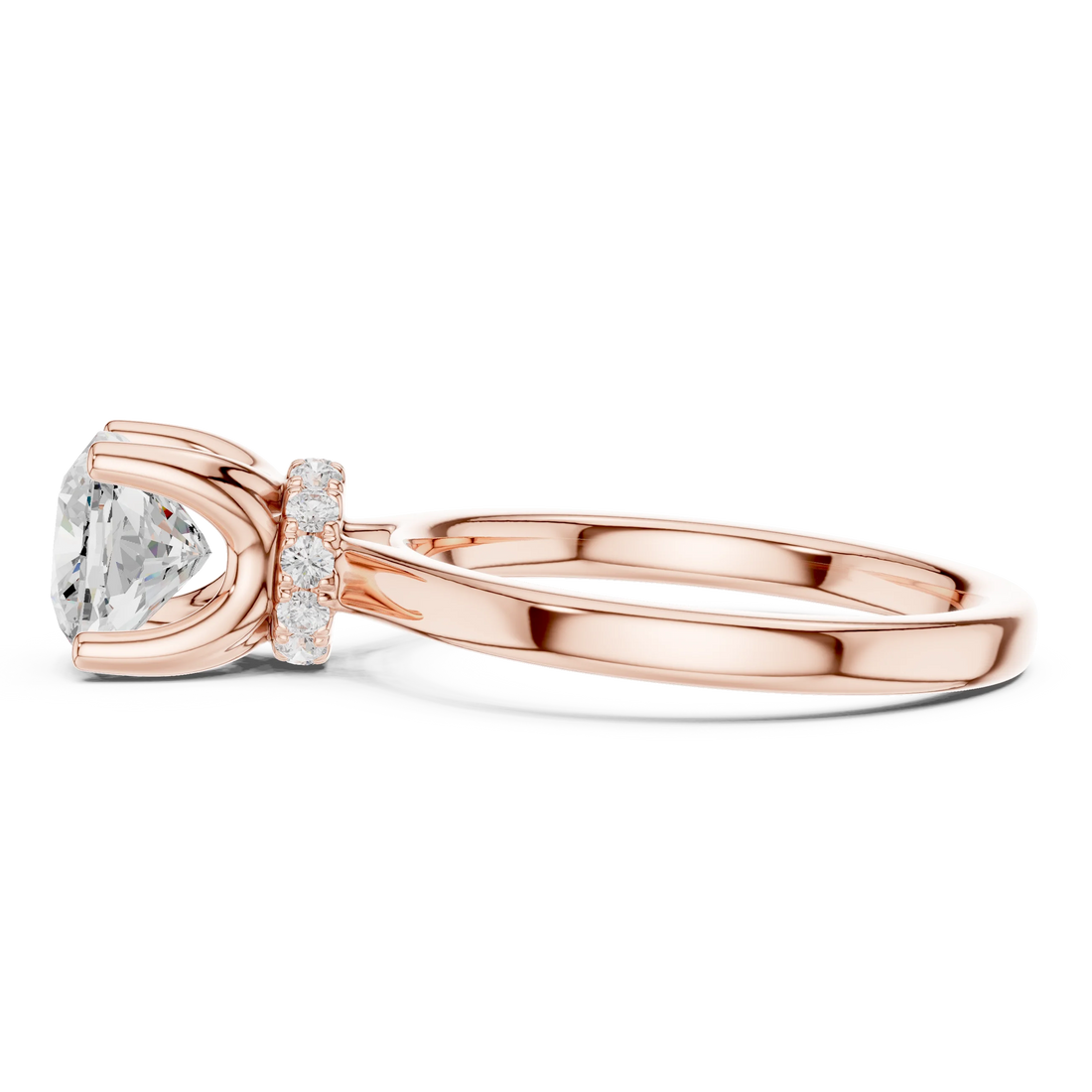 Side view of rose gold cushion cut solitaire ring highlighting hidden halo and domed band design