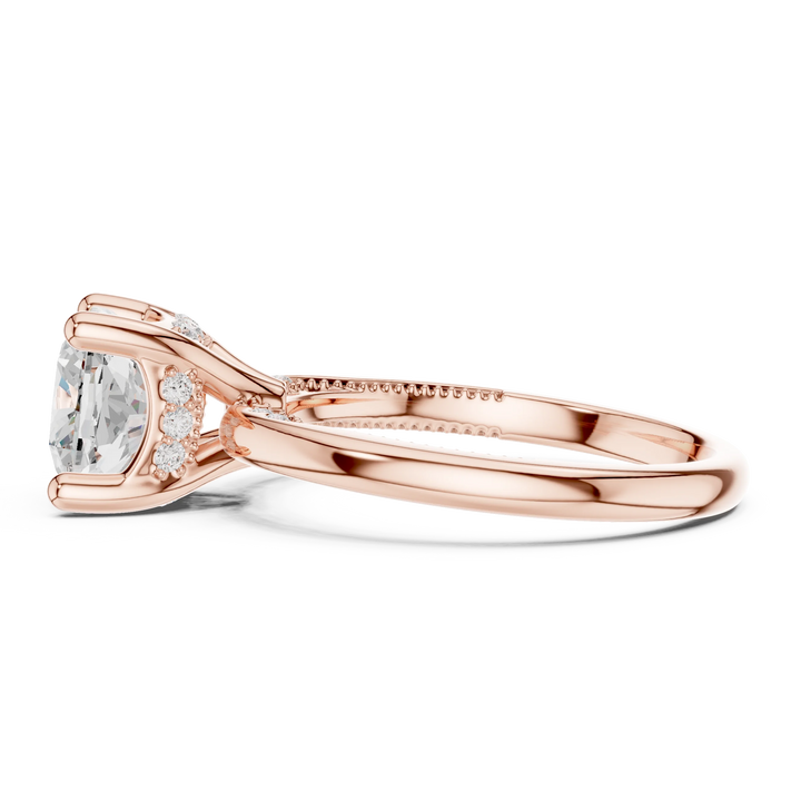 Side view of rose gold cushion cut solitaire ring highlighting hidden halo and domed band design