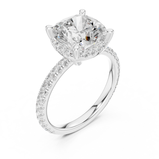 Front view of white gold cushion cut solitaire ring with hidden halo and thin pavé diamond band and lab-created diamond