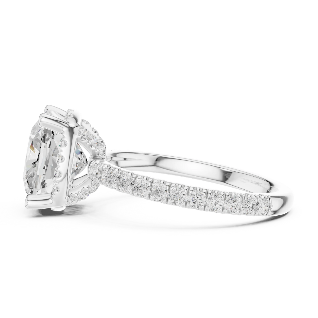 Side view of white gold cushion cut solitaire ring highlighting hidden halo and thin pavé band design