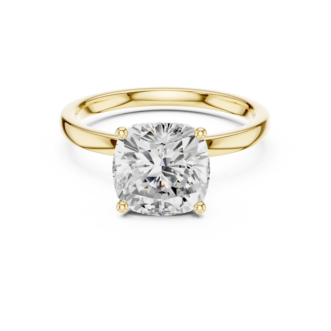 Lab-grown cushion cut solitaire ring in yellow gold with smooth domed band