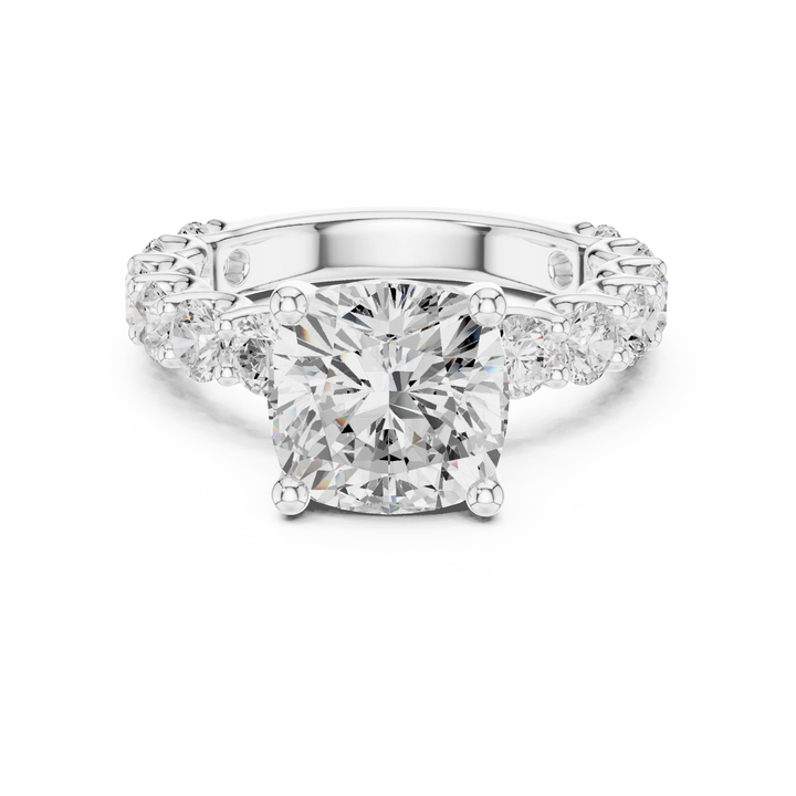 Lab-grown cushion cut solitaire ring in white gold with shared prong large stone band