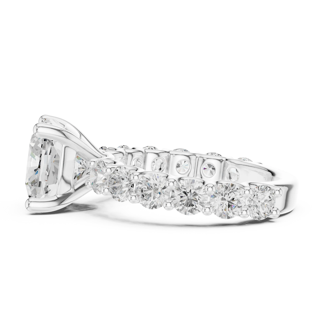 Side view of white gold cushion cut solitaire ring with shared prong large stone band and elevated setting