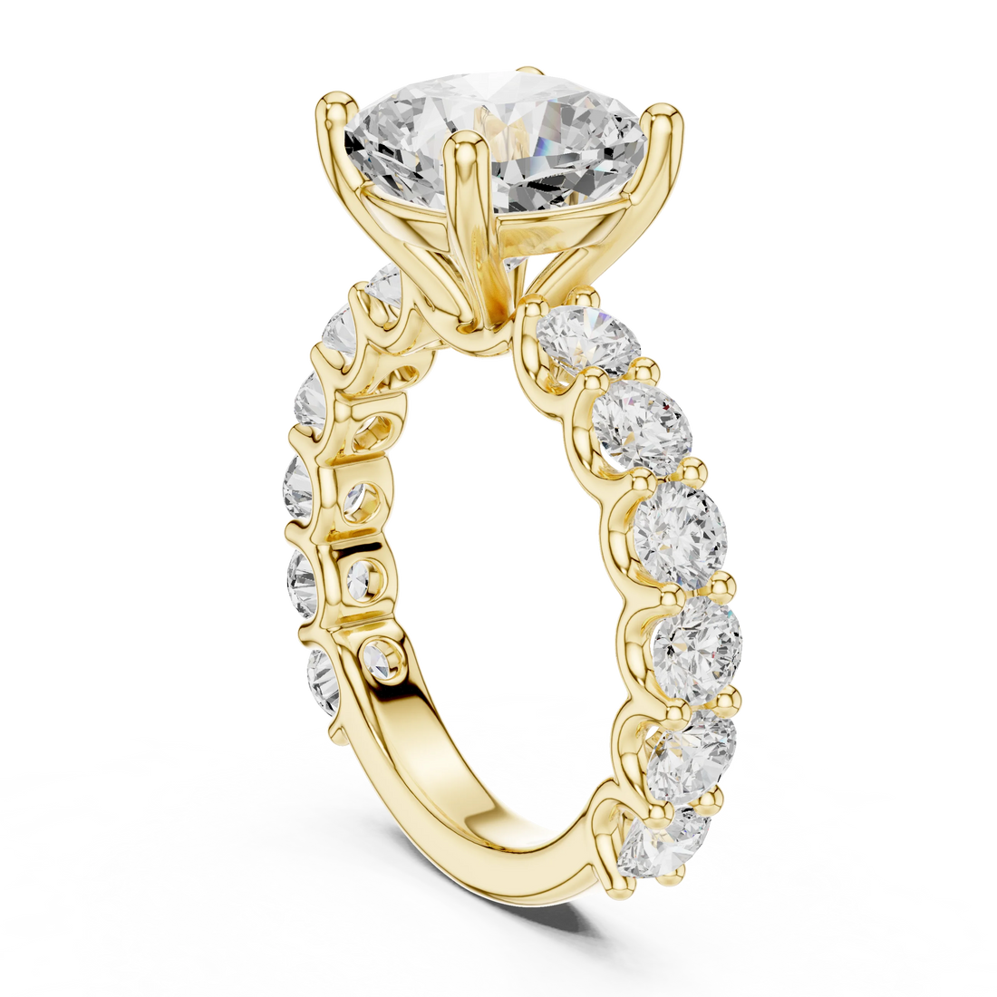 Back side view of yellow gold cushion cut solitaire ring showing shared prong large stone band and setting structure
