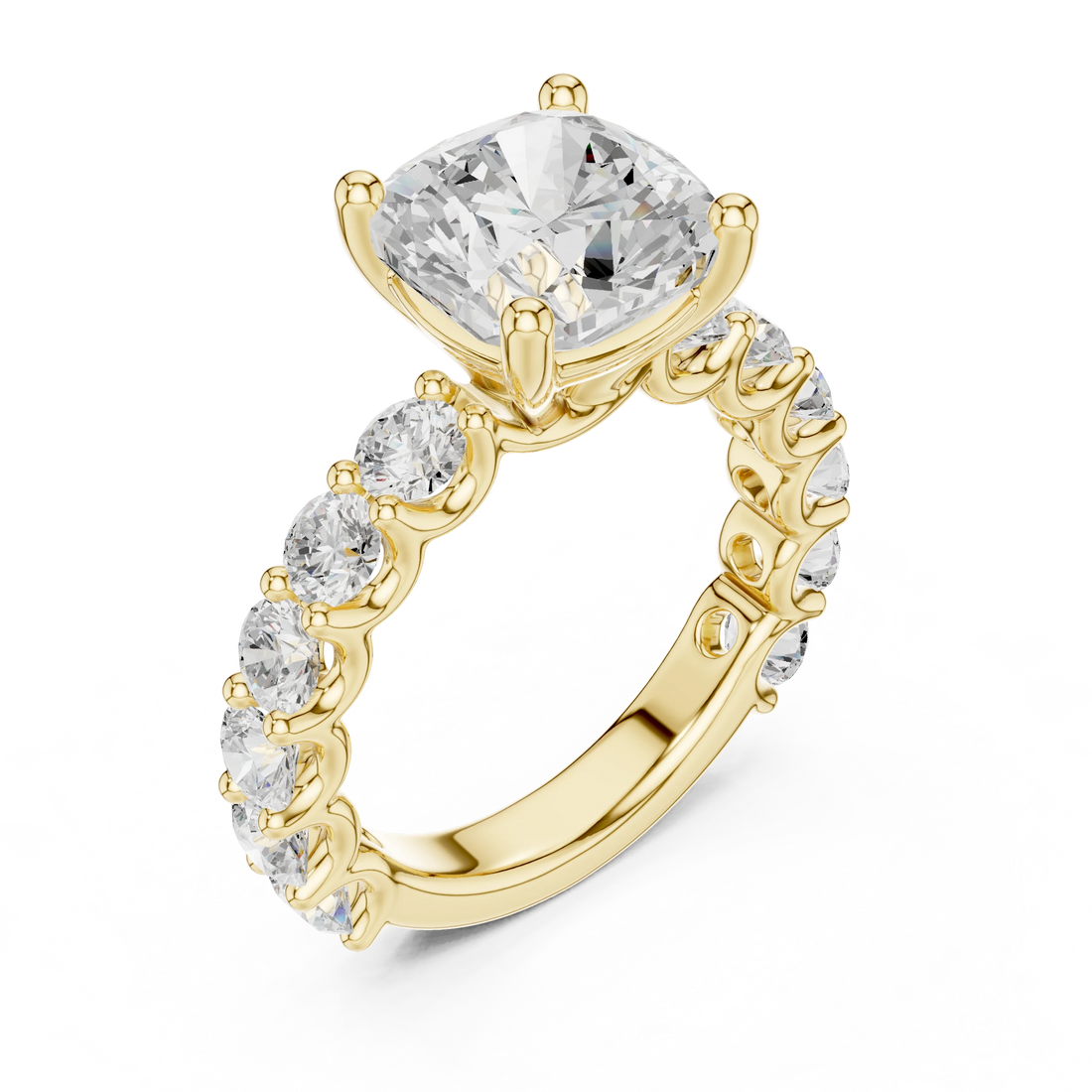 Front view of yellow gold cushion cut solitaire ring with shared prong large stone band and center gemstone