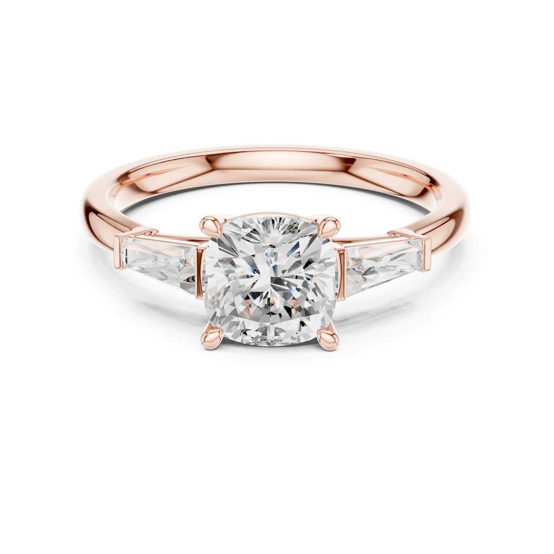 Rose gold cushion three-stone ring with tapered baguette side stones