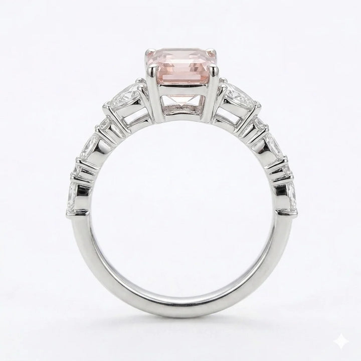 Side view of white gold emerald cut center stone ring with trillion side stones and lab-grown diamonds – Australia