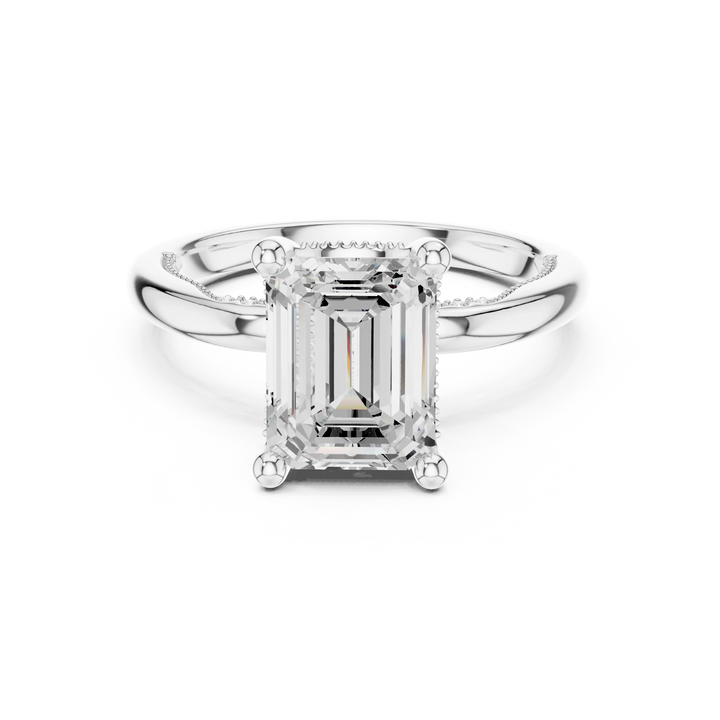 White gold emerald cut solitaire ring with hidden halo and domed band featuring lab-grown diamond, elegant design