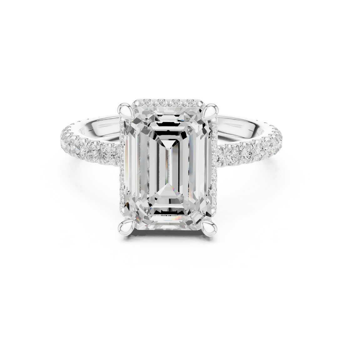 White gold emerald cut solitaire ring with hidden halo and thin pavé band featuring lab-grown diamond, elegant design