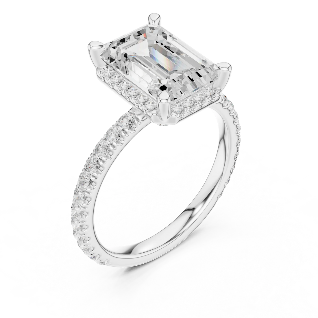Front view of white gold emerald cut solitaire ring with hidden halo and thin pavé diamond band and lab-created diamond