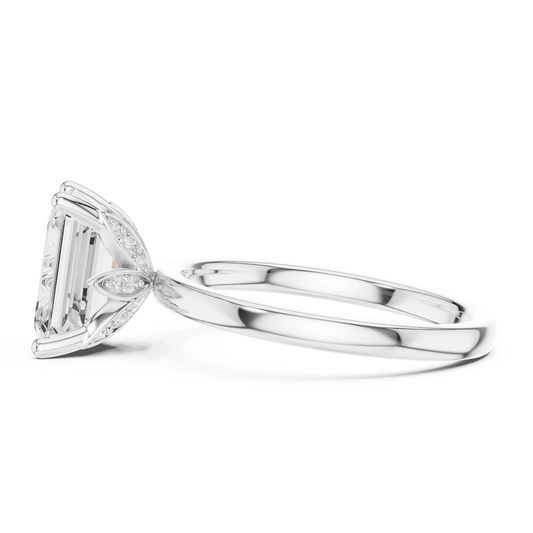 Side view of white gold emerald cut solitaire ring with domed band and raised setting