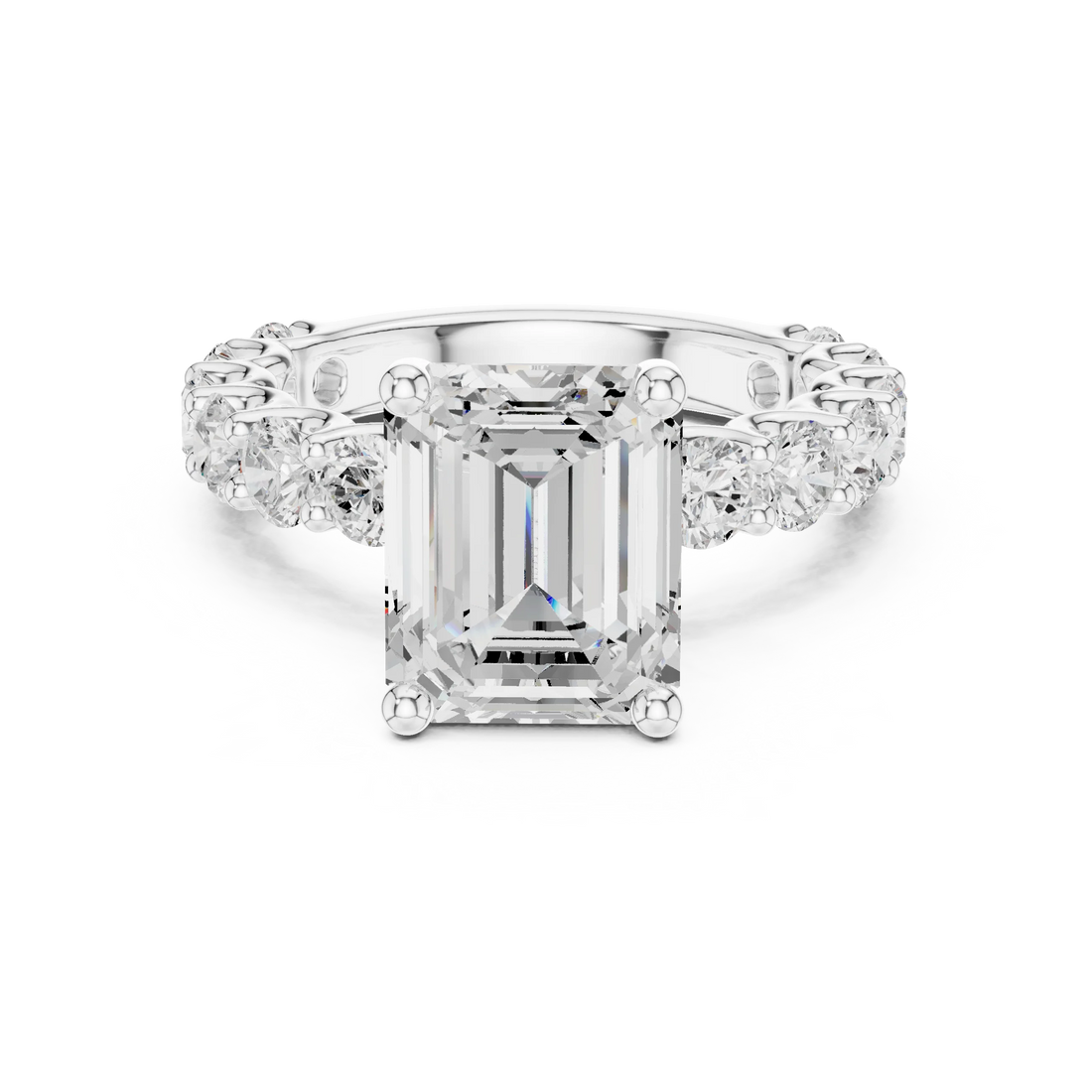 Lab-grown emerald cut solitaire ring in white gold with shared prong large stone band