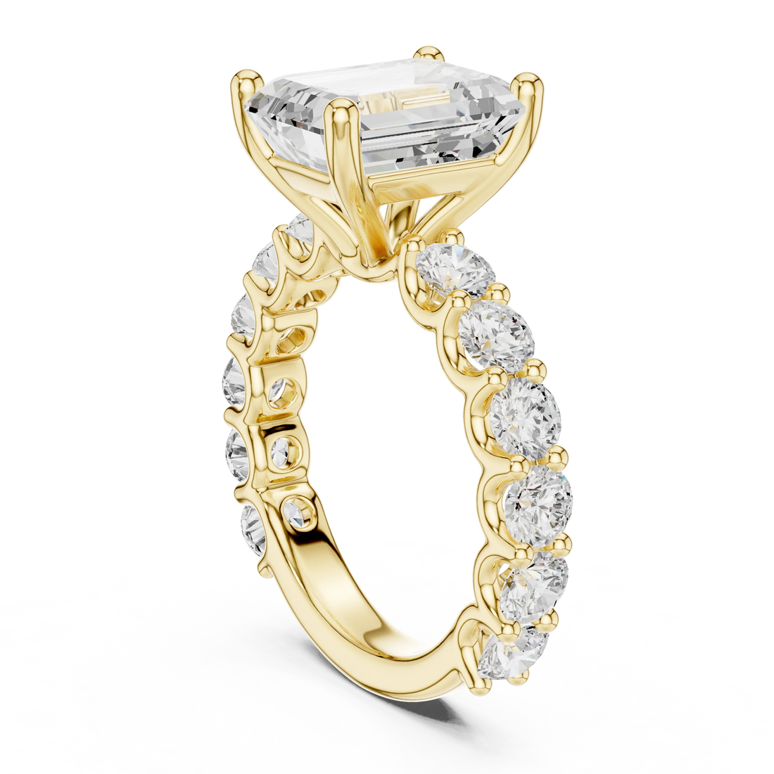 Back side view of yellow gold emerald cut solitaire ring showing shared prong large stone band and setting structure