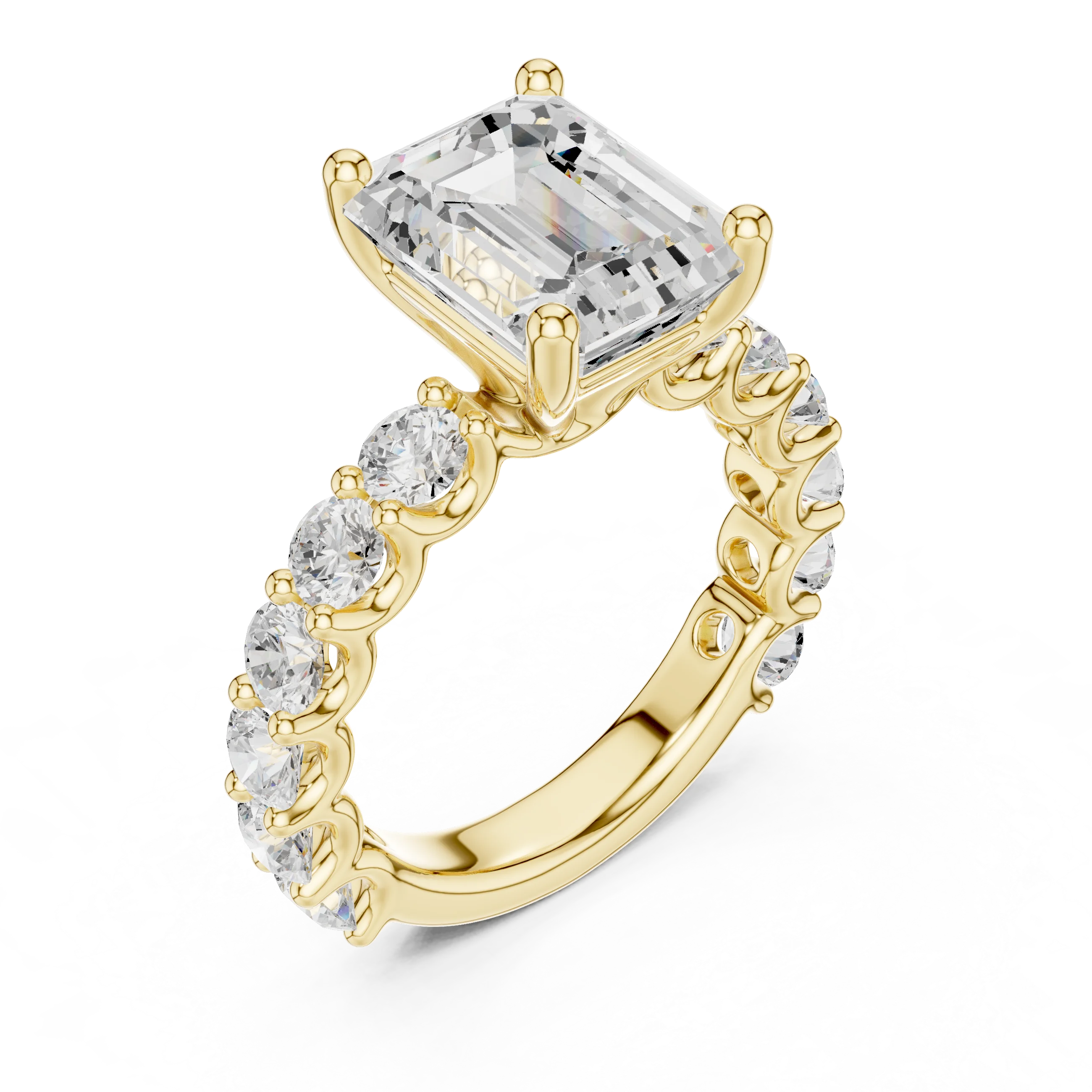Front view of yellow gold emerald cut solitaire ring with shared prong large stone band and center gemstone