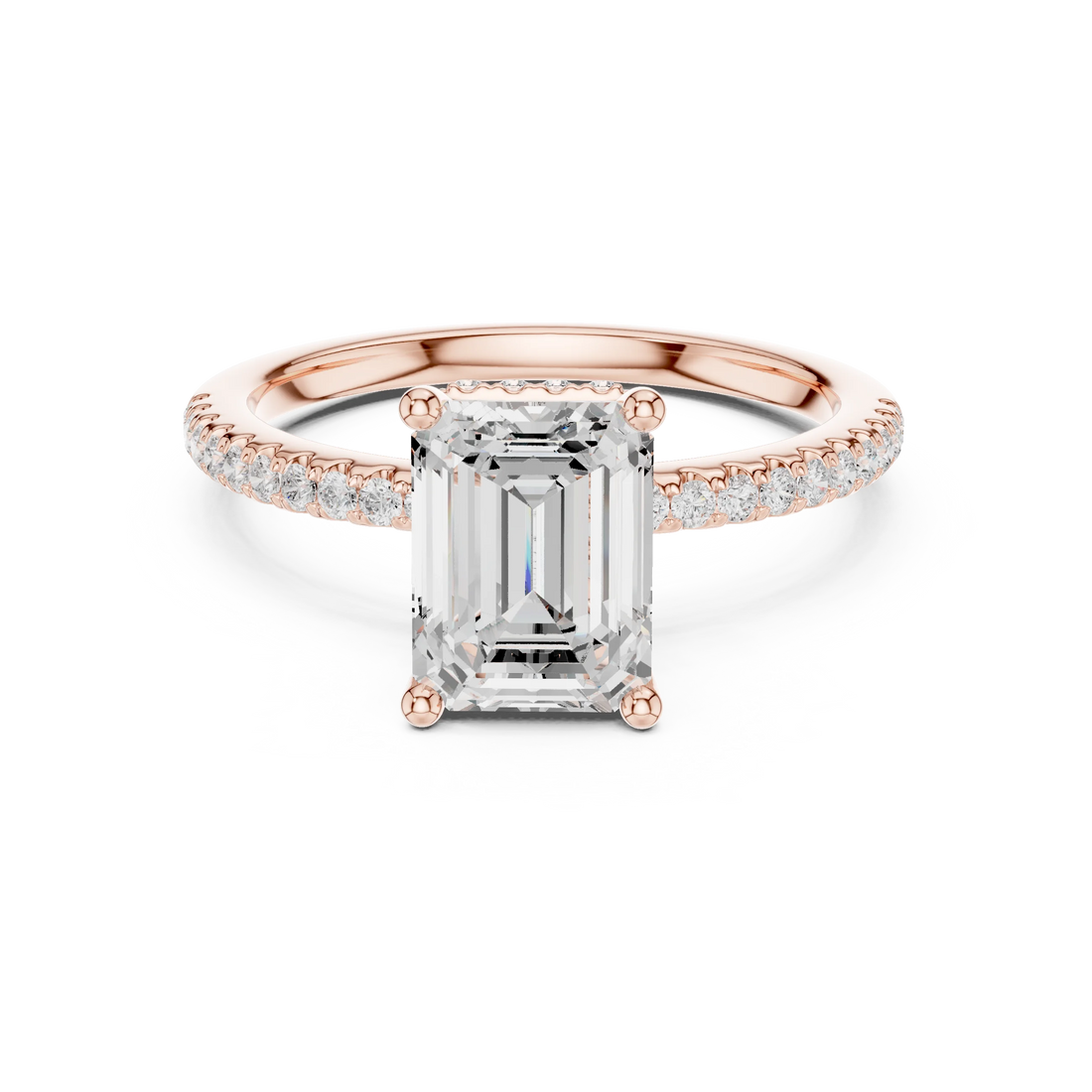 Rose gold emerald cut solitaire ring with thin pave band and lab-grown diamond, modern elegant look