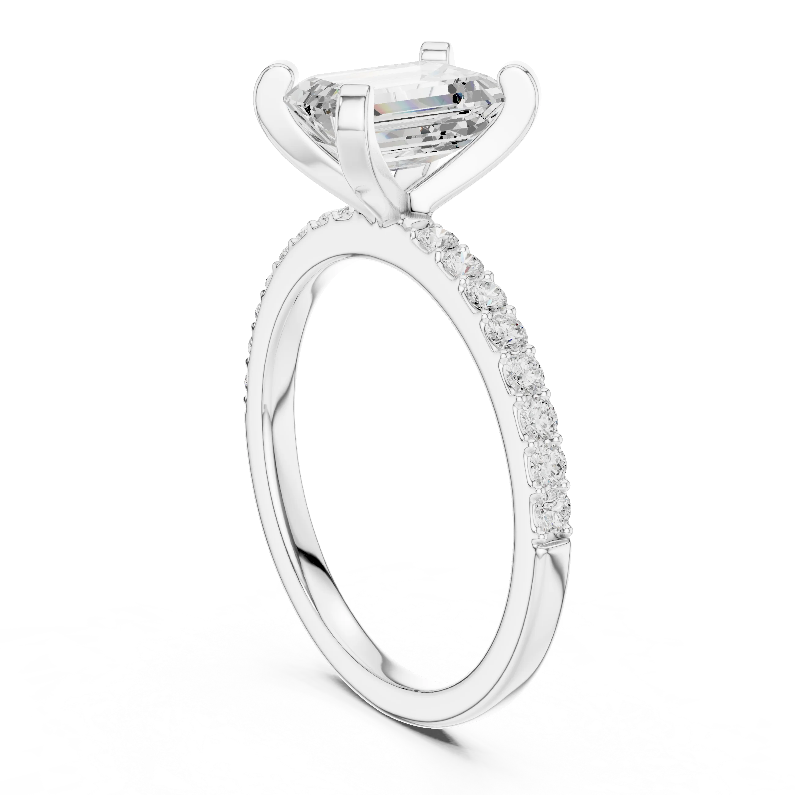 Back side view of white gold emerald solitaire ring showing thin pavé band and setting details