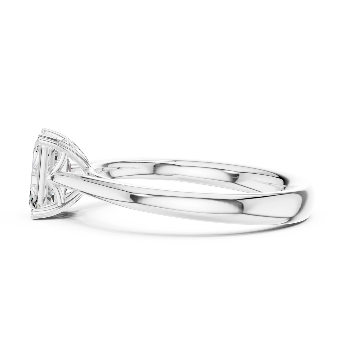 Side view of lab-grown emerald solitaire ring in white gold highlighting setting and band profile
