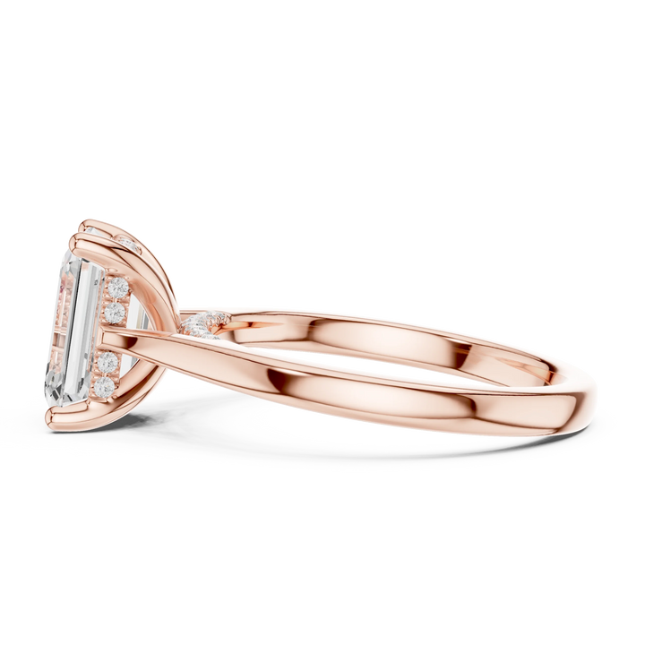 Side view of rose gold emerald solitaire ring with plain domed band and lab-grown diamond – Australia