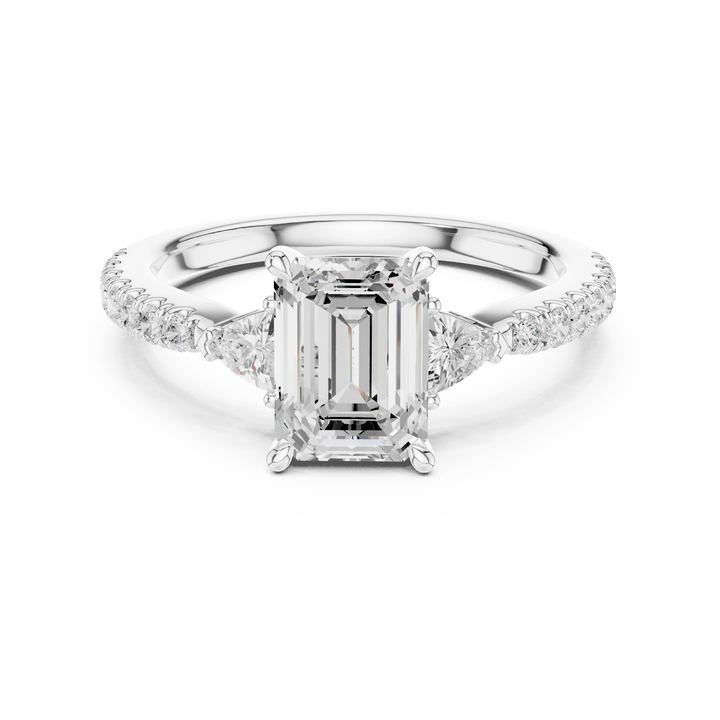 Lab-grown emerald cut three stone diamond pave ring in white gold, elegant top view
