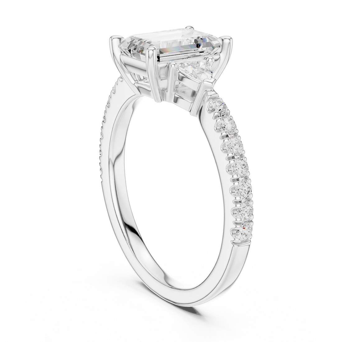 Back side view of white gold emerald three stone diamond pave ring, showing band and setting.