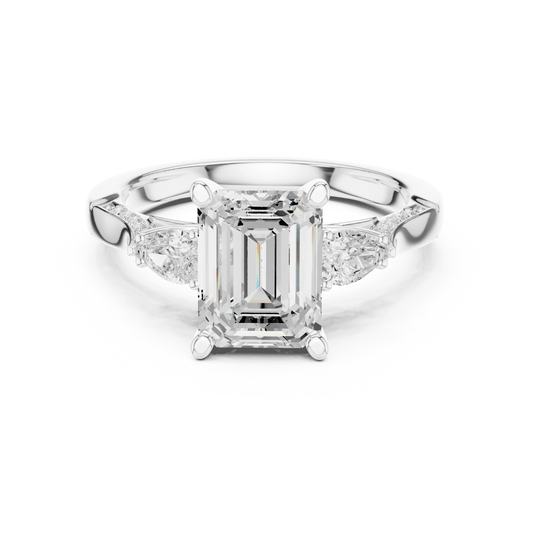 Emerald three stone ring in white gold with pear side stones, accent band and lab-grown diamonds – Australia