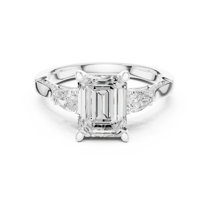 Emerald three stone ring in white gold with pear side stones, accent band and lab-grown diamonds – Australia