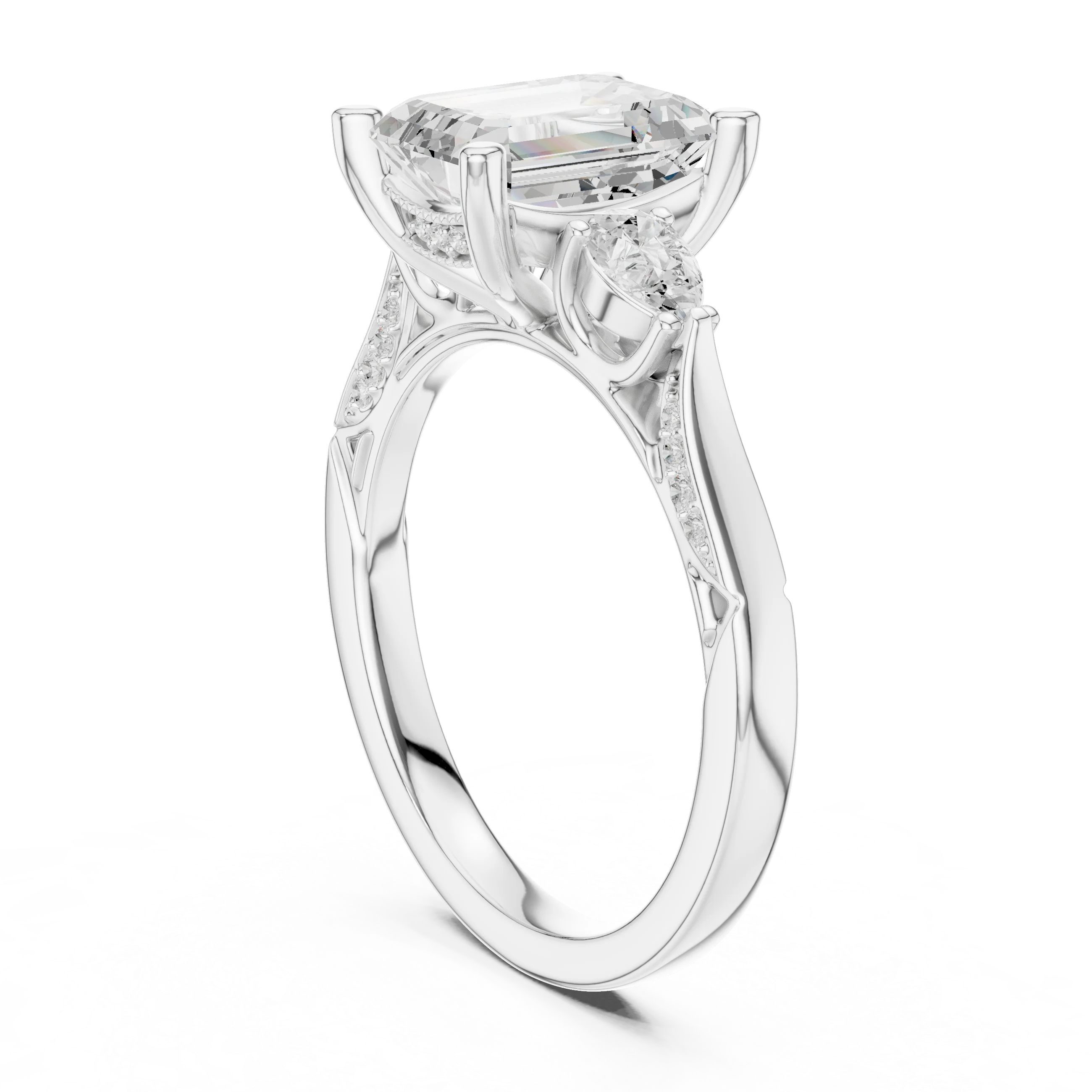 Back side view of white gold emerald three stone ring with pear side stones, accent band and lab-grown diamonds – Australia