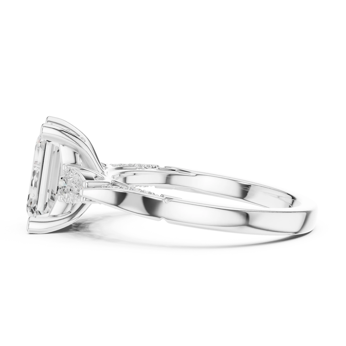 Side view of white gold emerald three stone ring with pear side stones, accent band and lab-grown diamonds – Australia
