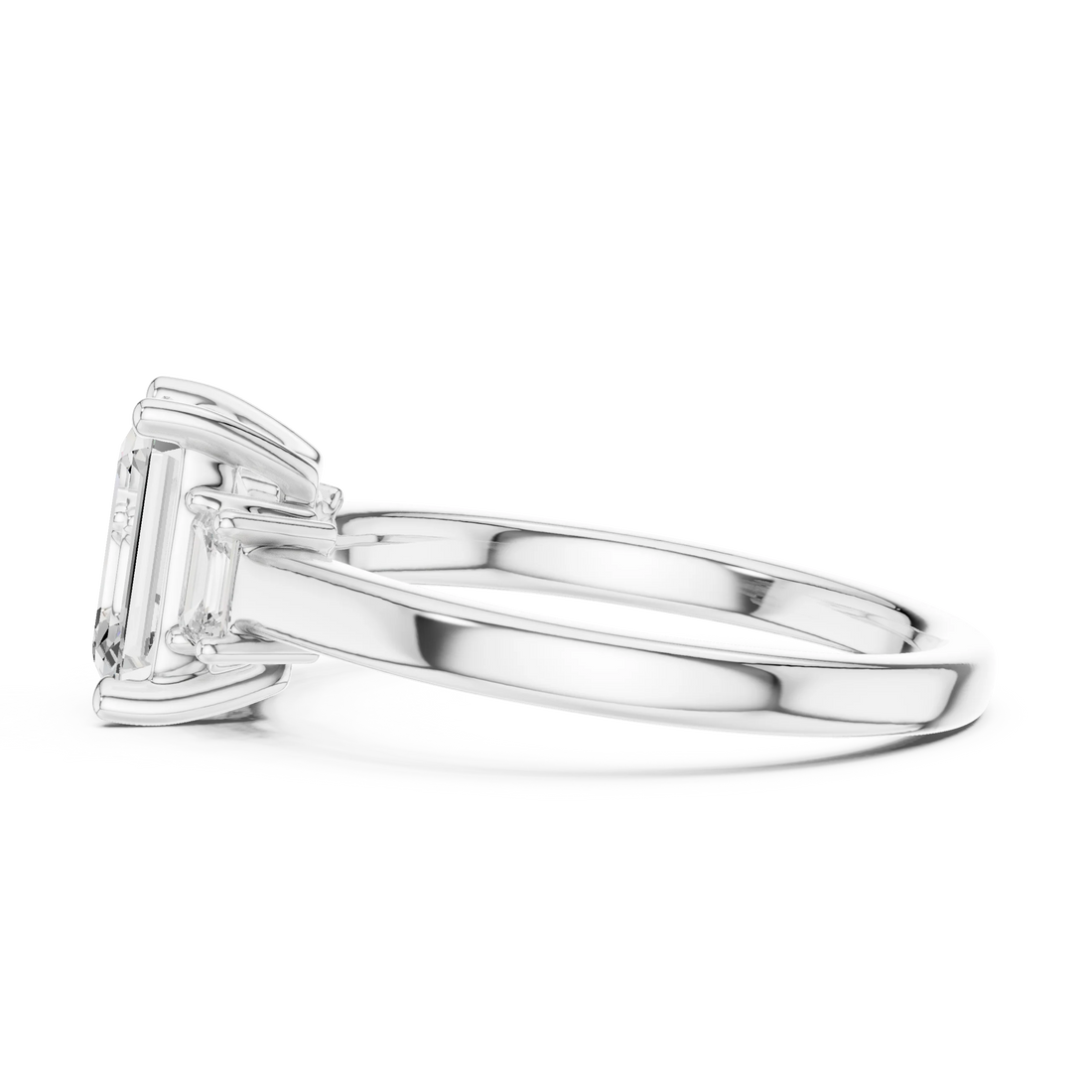 Side view of white gold emerald cut three stone diamond ring