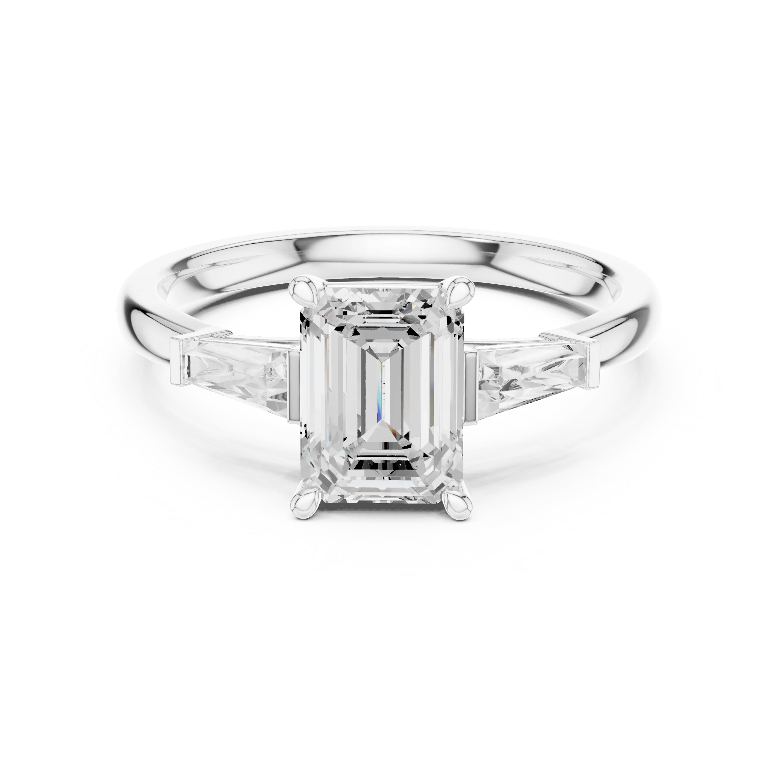 White gold emerald three-stone ring with tapered baguette side stones