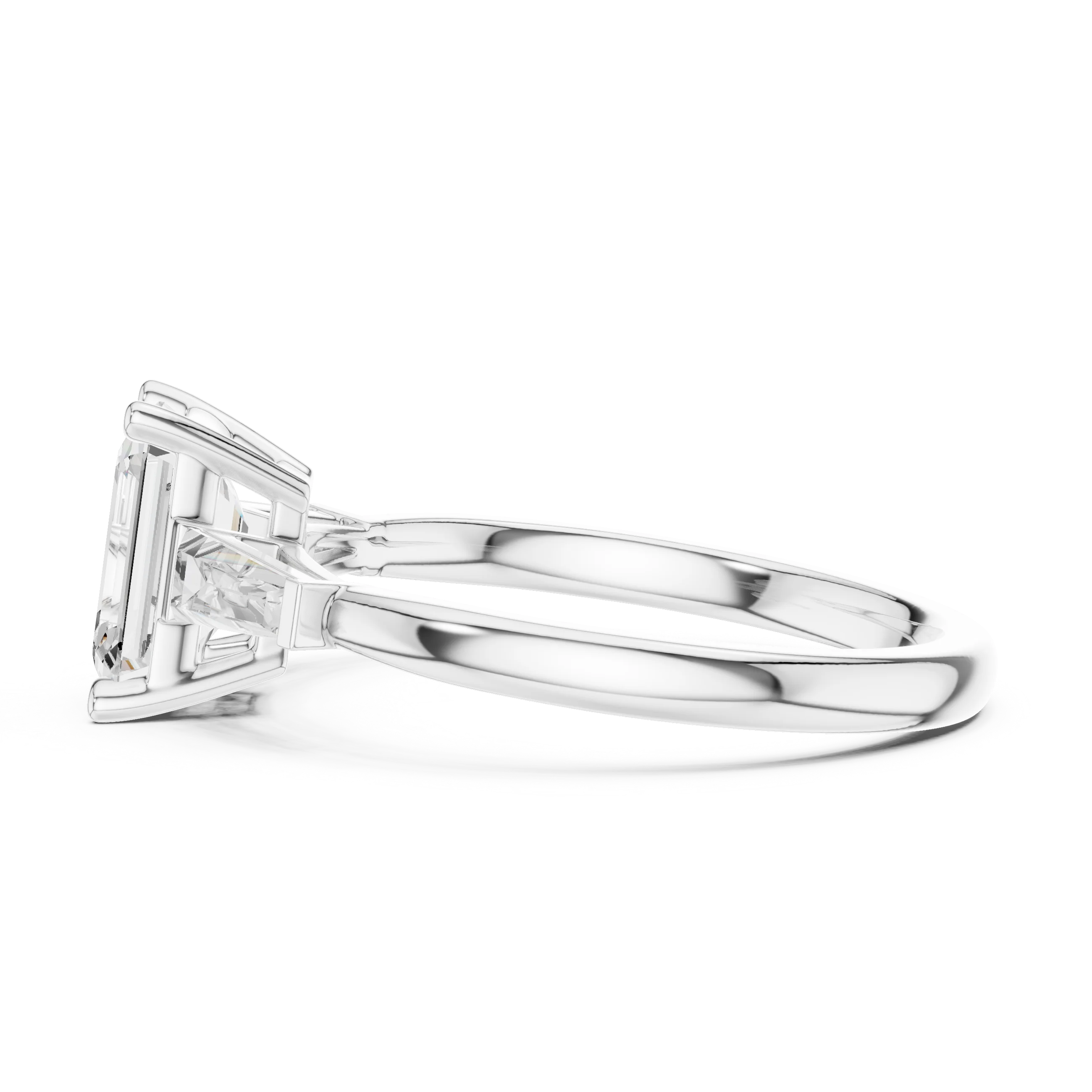 White gold emerald three-stone ring with tapered baguette side stones back view